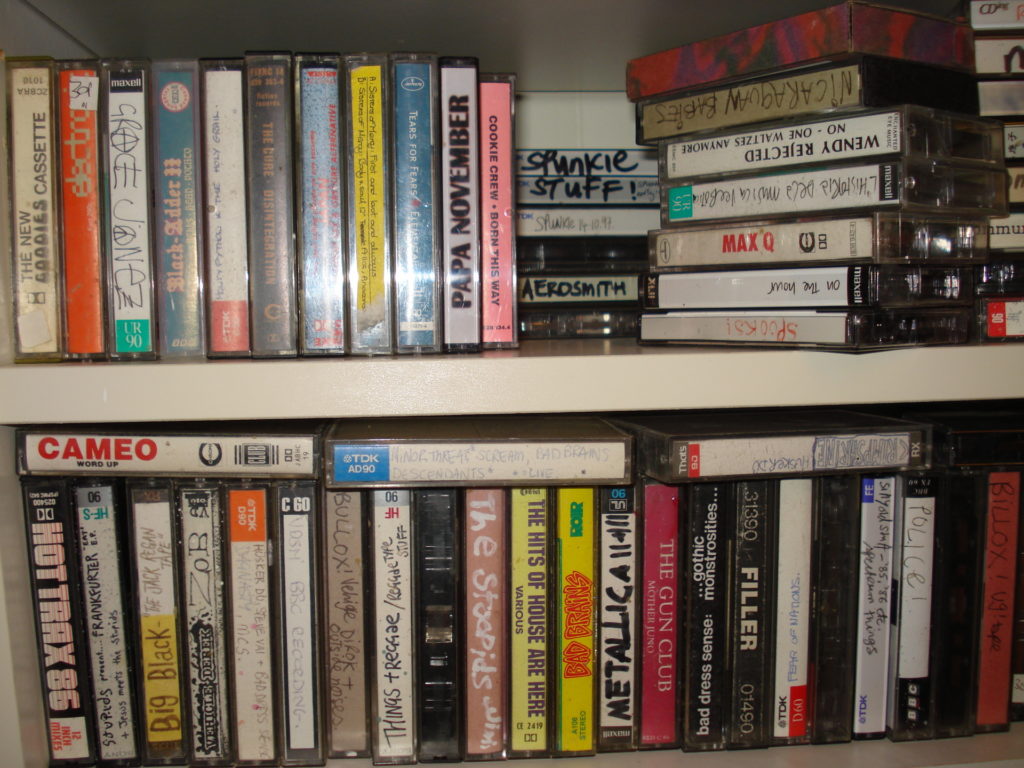 A shelf full of cassettes